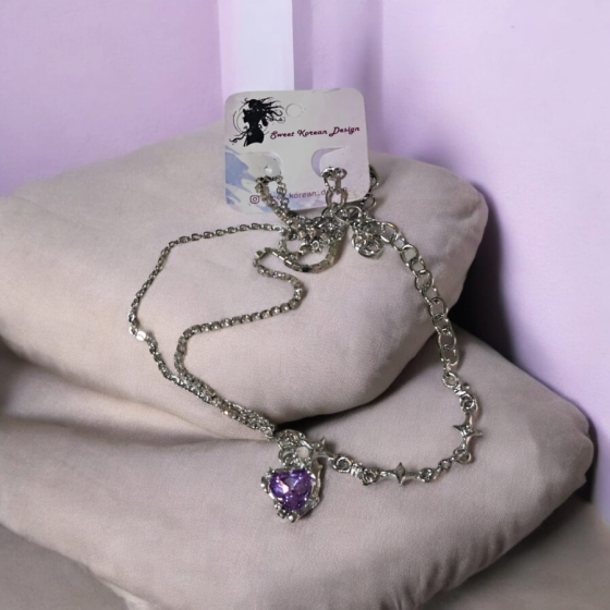 Doble cadena con corazón violeta