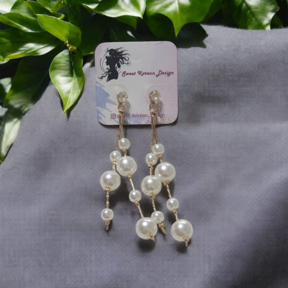 Perlas colgantes